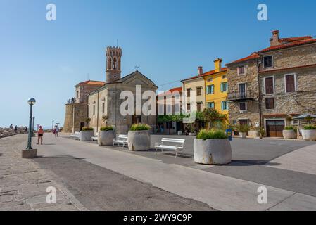 Piran, Slovenia, 22 June 2023: Cathedral overlooking Boats mooring in ...