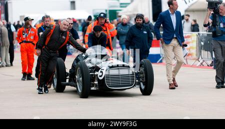A continuation version of the Legendary Pre-war BRM V16 Formula One Car, in the international paddock, at the 2023 Silverstone Festival. Stock Photo