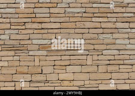 Uniform Sandstone Brick Wall Stock Photo