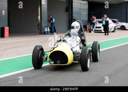 Chris Philips Green and Yellow, 1952 Cooper Bristol Mk2, taking part in the 75th Anniversary demonstration of Post '66 Formula One Cars Stock Photo