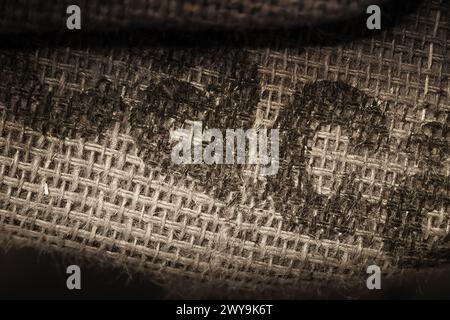 Dark brown burlap background. Jute sackcloth bagging canvas texture Stock Photo