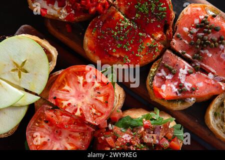 Bruschetta on wood boards sitting on table Stock Photo
