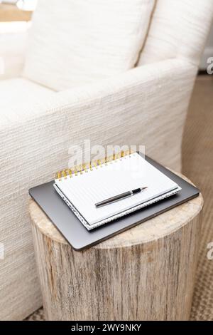 Notepad and pen on tablet in a cozy corner Stock Photo
