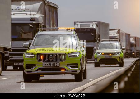 National Highways traffic officers attending an incident on a smart motorway in England. Stock Photo