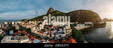 Aerial drone panorama of Urca neighbourhood and surrounding Botafogo and Guanabara Bay, UNESCO World Heritage Site, between the Mountain and the Sea, Stock Photo