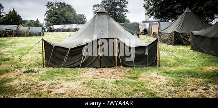 SAINTE MERE L'EGLISE, NORMANDY, FRANCE - JUNE 6 2023. Second world war commemoration. Military camp reconstitution Tents. Stock Photo