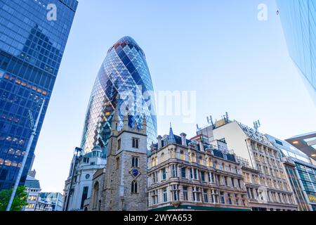 London, UK - May 20, 2023: The Gherkin, formally 30 St Mary Axe and previously known as the Swiss Re Building, a commercial glass skyscraper in London Stock Photo