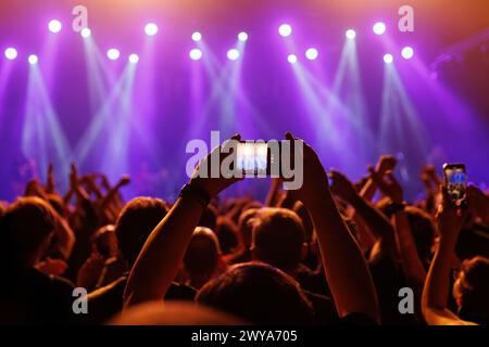 A mesmerizing moment unfolds at a live concert, recorded via mobile