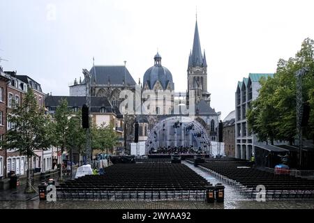 Katschhof, a tree-filled square, location of festivals and markets, with the iconic Aachen Cathedral, one of the oldest cathedrals in Europe behind, A Stock Photo