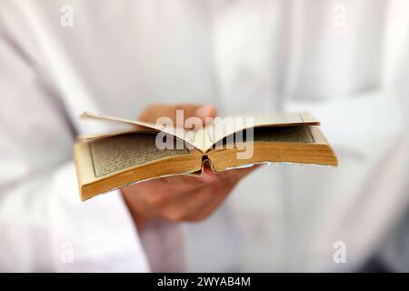 Muslim man reading an Arabic Holy Quran Koran, Jamiul Azhar Mosque, Vietnam, Indochina, Southeast Asia, Asia Copyright: Godong 809-9020 Stock Photo