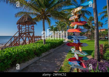 View of colourful hotel destination signpost near Puerto Morelos, Caribbean Coast, Yucatan Peninsula, Mexico, North America Copyright: FrankxFell 844- Stock Photo