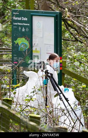 Forensic officers at Kersal Dale, near Salford, Greater Manchester, where a major investigation has been launched after human remains were found on Thursday evening. Greater Manchester Police (GMP) said officers were called by a member of the public who found an 'unknown item wrapped in plastic'. Picture date: Friday April 5, 2024. Stock Photo