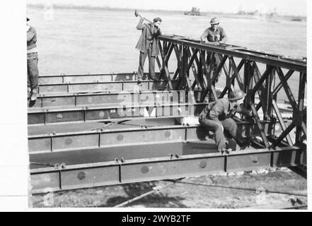 BUILDING LAMBETH BRIDGE - Original wartime caption: Sections of the bridge being constructed. Photographic negative , British Army, 21st Army Group Stock Photo