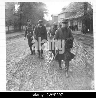 AMERICAN AIRMEN PRISONERS LIBERATED AT GUDOW TODAY - Original wartime caption: Scenes in the town of Gudow where hundreds of Germans surrendered today and gave up some 1,400 American prisoners of war. Photographic negative , British Army, 21st Army Group Stock Photo