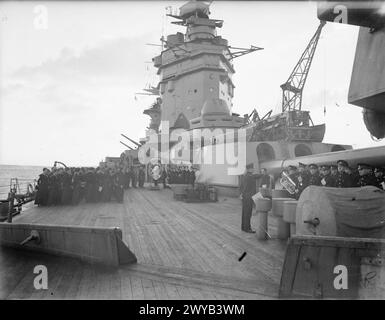 SCENES ON BOARD A BATTLESHIP AT SEA. 1940 OR 1941, ON BOARD HMS RODNEY. - Divisions on the starboard deck of the battleship. , Stock Photo