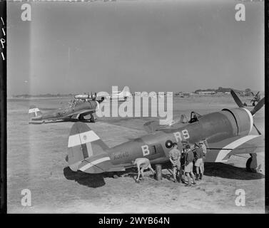 ROYAL AIR FORCE OPERATIONS IN THE FAR EAST, 1941-1945. - Two Republic Thunderbolt Mark IIs (KJ140 'RS-B' and HD265 'RS-G') of No. 30 Squadron RAF being serviced at Jumchar, India. Note 30 Squadron's palm tree badge, which has been painted onto the white recognition stripes on the Thunderbolts' tails. Parked behind them is a visiting Boeing B-29 Superfortress of the 40th Bombardment Group, 20th USAAF. , Royal Air Force, 30 Squadron Stock Photo