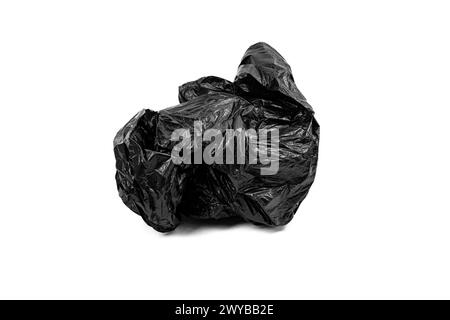 Crumpled black plastic garbage bag isolated on white background. Stock Photo