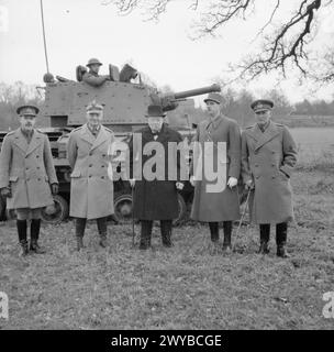 THE ALLIED ARMIES IN BRITAIN, 1940-1945 - Winston Churchill with other Allied Commanders following the Cruiser Mk IIA CS (A10) tank demonstration.From left to right: General Giffard Le Quesne Martel, the Commander of the Royal Armoured Corps; General Władysław Sikorski; Winston Churchill; General Charles de Gualle; General Andrew Thorne, the GOC Scottish Command. The Prime Minister witnessed a tank demonstration in which he was shown the capabilities of various armoured fighting vehicles over rough country near Frensham, Surrey. With him were General Władysław Sikorski, the Prime Minister of t Stock Photo