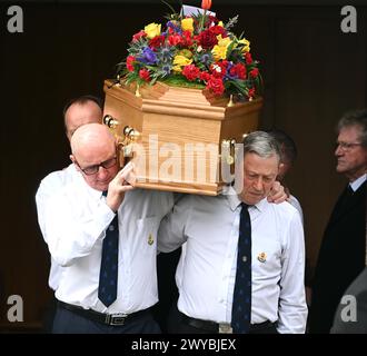 The coffin of Bobbie McKee is carried out of Mourne Presbyterian Church ...