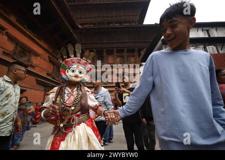 RUDRAYANI NAACH IN KATHMANDU AFTER GAP OF 12 YEARS A Nepali masked dancer in the form of deity enters the Nasal Chowk in the Kathmandu Durbar Square, a UNESCO World Heritage Site of Nepal as a part of Rudrayani Devi Naach held in gap of 12 years in Kathmandu on 5 April, 2024. Masked dancers from the ancient city of Khokana in Lalitpur District travel to Kathmandu once in 12 years to showcase the dance as part of the continued tradition in the Himalayan Nation. Copyright: xSubashxShresthax Stock Photo