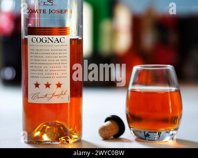 In this photo illustration, a bottle of Comte Joseoh Cognac  seen displayed on a table. Stock Photo