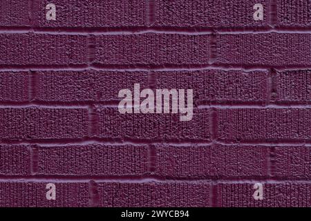 Painted dark pink brick wall texture vertical background Stock Photo