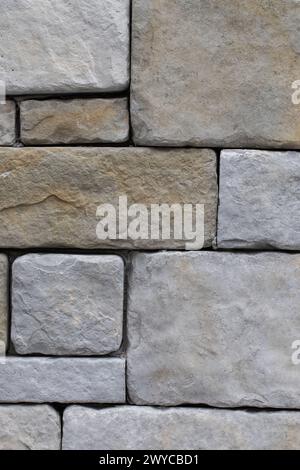 Large stone wall grey texture background, close up Stock Photo