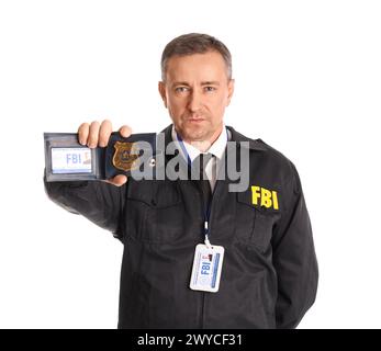 Mature FBI agent showing document on white background Stock Photo