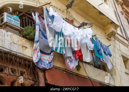 Clothesline on a balcony in building facade in Havana, Cuba Stock Photo