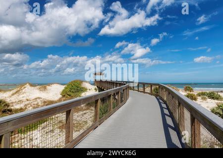 Smyrna Dunes Park with elevated boardwalk and fishing pier in New Smyrna Beach, Florida. Stock Photo