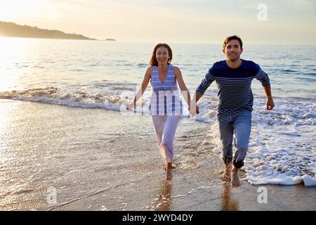 Couple, Beach, Hendaye, Aquitaine, Pyrenees Atlantiques, France, Europe. Stock Photo