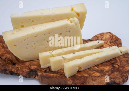 Slice of Italian Asiago cow's milk cheese Stock Photo - Alamy