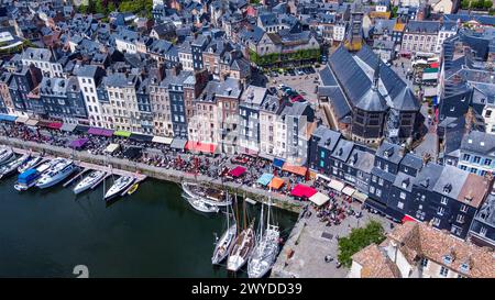 Small ancient town (about 1000 years history) Bay with yachs and cathedral behind first line. People enjoying of holiday in France in May (May 18) Stock Photo