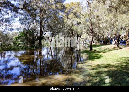 Saturday 6th April 2024. Sydney has been hit with a deluge of rain over the past 48 hours, with some areas including Penrith receiving the heaviest rainfall ever, In Narrabeen residents around Narabeen lagoon, pictured, have been asked to evacuate due to rising water levels from Narrabeen lake on Sydney northern beaches., where over 150mm of rain has fallen. There have been over 50 flood watches along rivers in New South Wales and Warragamba dam is expected to spill.  Credit Martin Berry @alamy live news. Stock Photo