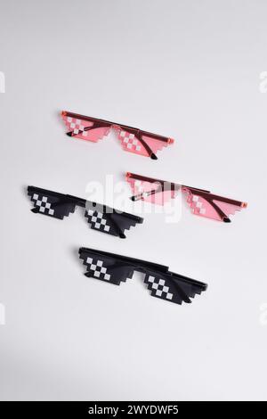 Thug life glasses black and pink color isolated on white background. Pixel art glasses Stock Photo