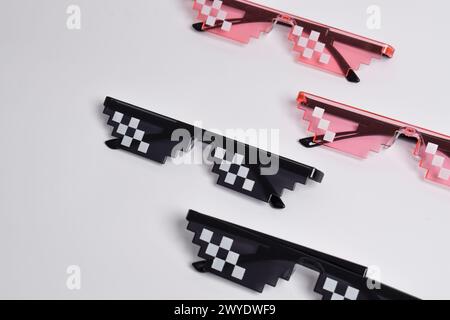 Thug life glasses black and pink color isolated on white background. Pixel art glasses Stock Photo
