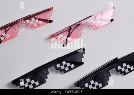 Thug life glasses black and pink color isolated on white background. Pixel art glasses Stock Photo