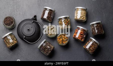 Tea time assortment: Various dry tea leaves. Flat lay Stock Photo