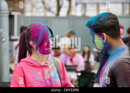 Berlin, Germany, March 30, 2024. Hundreds of people celebrate Holi Festival, a sacred Hindu holiday. Stock Photo