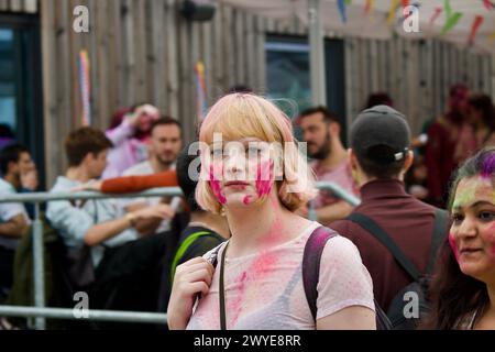 Berlin, Germany, March 30, 2024. Hundreds of people celebrate Holi Festival, a sacred Hindu holiday. Stock Photo