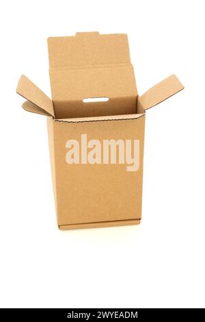 Brown cardboard rectangular shape box on white background. Environmentally friendly recycled reusable material for delivery parcel package. Stock Photo