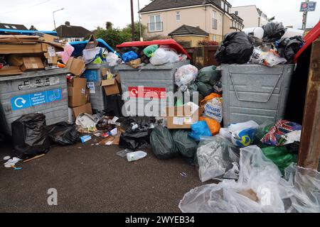 Overflowing recycling bins at a local council collection facility Stock Photo