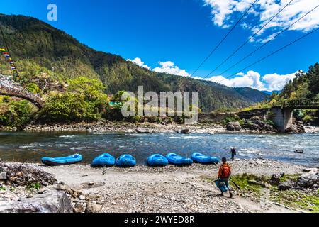 Punakha, Bhutan - Mar 22,2024 Rafting facilities are placed along the river Stock Photo