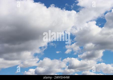 Cloud clusters scattered in blue sky With copyspace for text. Stock Photo