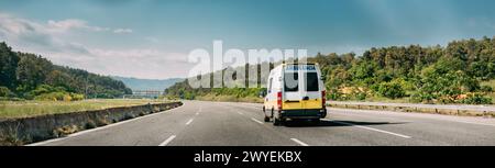 Spanish Emergency Ambulance Van Iveco Car Moving On Spanish Motorway Road Stock Photo