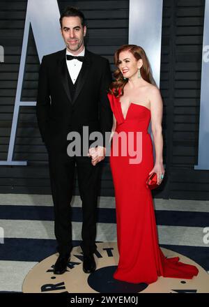 (FILE) Isla Fisher Announces Divorce from Sacha Baron Cohen After 13 Years of Marriage. Fisher announced the news on Friday, April 5, 2024 in a personal message shared to her Instagram Story. BEVERLY HILLS, LOS ANGELES, CALIFORNIA, USA - MARCH 04: English comedian, actor, writer and producer Sacha Baron Cohen and wife/Australian actress Isla Fisher arrive at the 2018 Vanity Fair Oscar Party held at the Wallis Annenberg Center for the Performing Arts on March 4, 2018 in Beverly Hills, Los Angeles, California, United States. (Photo by Xavier Collin/Image Press Agency) Stock Photo