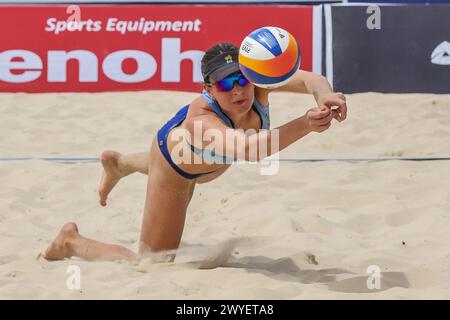 Laguna Province, Philippines. 6th Apr, 2024. Elizabeth Alchin saves the ball during the women's round of 16 match between Elizabeth Alchin/Tara Phillips of Australia and Genesa Jane Eslapor/Mary Klymence Orillaneda of the Philippines at the Asian Volleyball Confederation (AVC) Beach Tour Nuvali Open in Laguna Province, the Philippines, April 6, 2024. Credit: Rouelle Umali/Xinhua/Alamy Live News Stock Photo