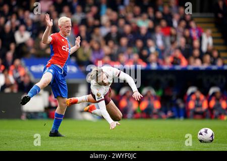 Crystal Palace's Will Hughes (left) challenges Manchester City's Jack Grealish during the Premier League match at Selhurst Park, London. Picture date: Saturday April 6, 2024. Stock Photo