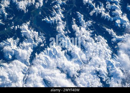 Mountain range covered in snow, Austria. Digital enhancement of an image furnished by NASA Stock Photo