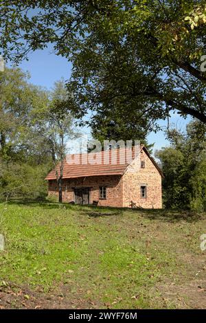 red brick walls of an abandoned farm building in western central Serbia Stock Photo